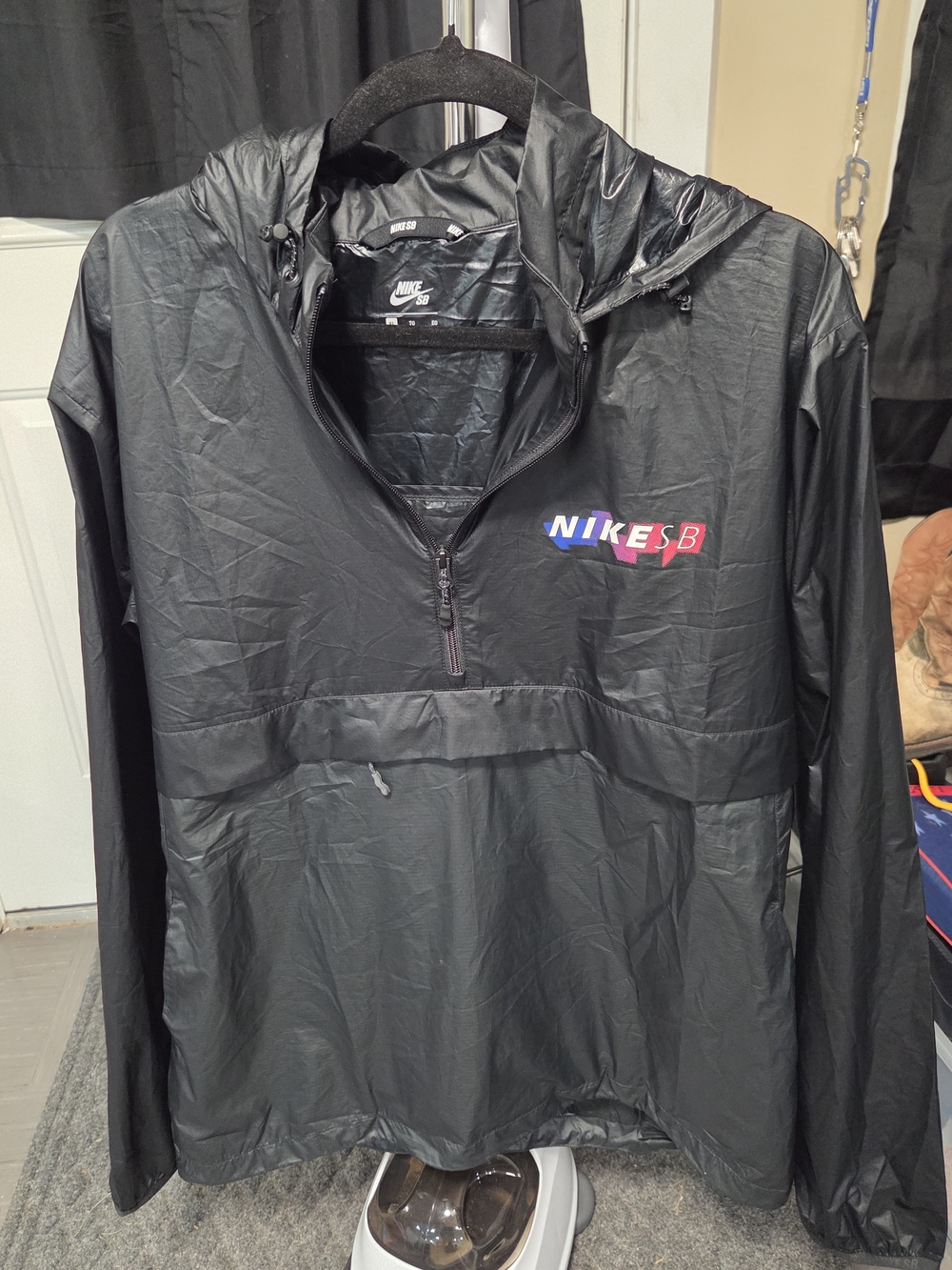 Nike Black Hooded Half-Zip Windbreaker with Multicolor SB Logo